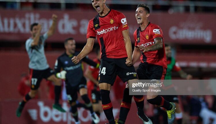 Martin Valjent of Mallorca and Antonio Raillo of Mallorca celebrate after winning during the play off second leg match between Deportivo