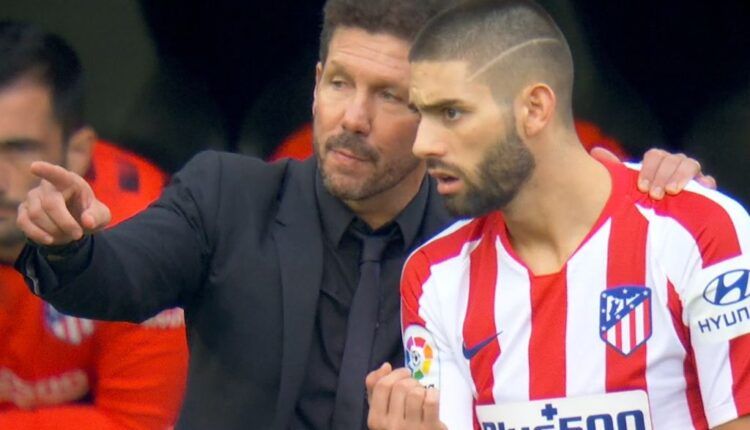 Simeone con Carrasco en el Bernabéu