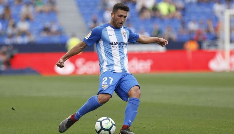 Álex Robles en un partido con el primer equipo del Málaga