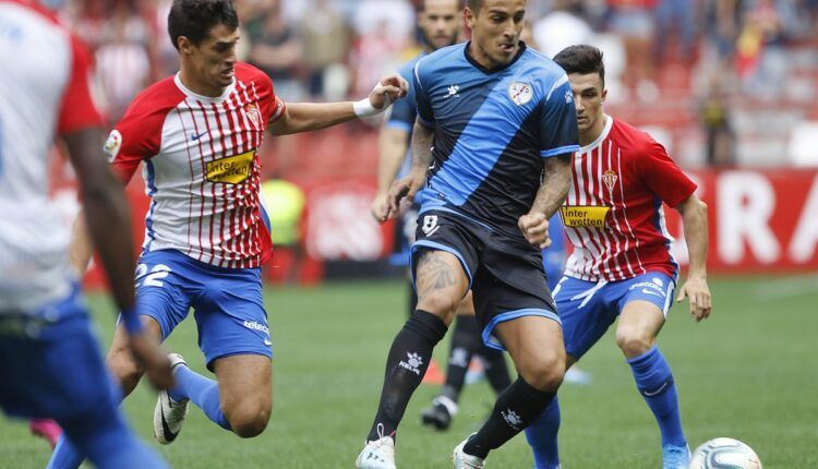 Lance de juego en un Sporting - Rayo