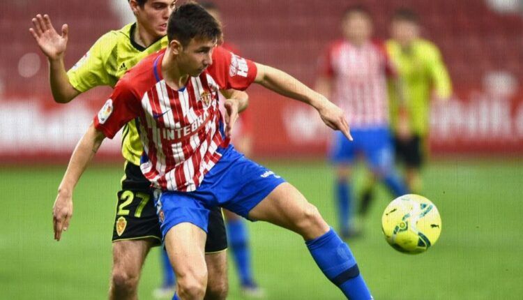 Saúl García con Francho Serrano en el Sporting-Zaragoza