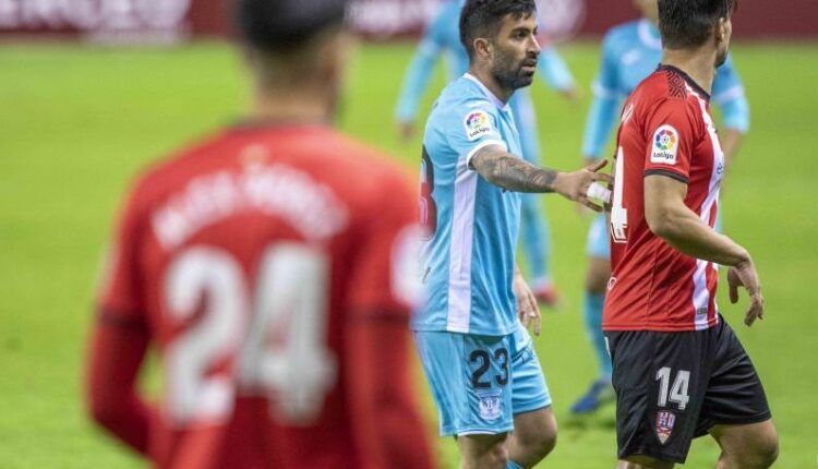 Michael Santos con Ion Errasti en un Logroñés-Leganés