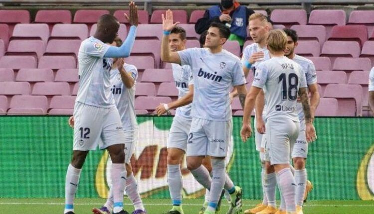 Jugadores del Valencia celebran un gol