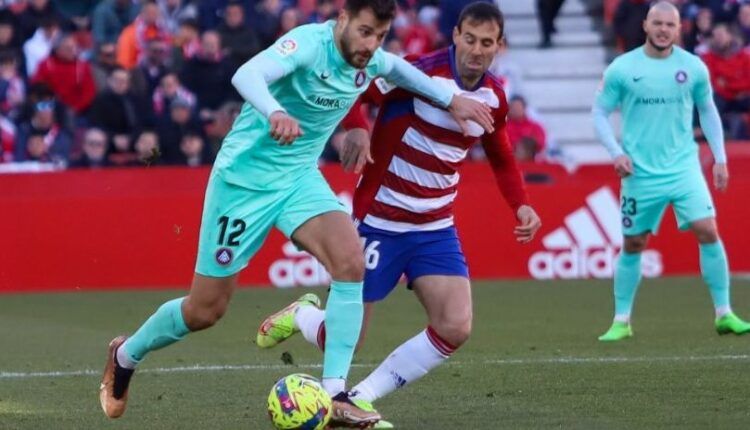 Sinan Bakis y Víctor Díaz en un Granada-Andorra