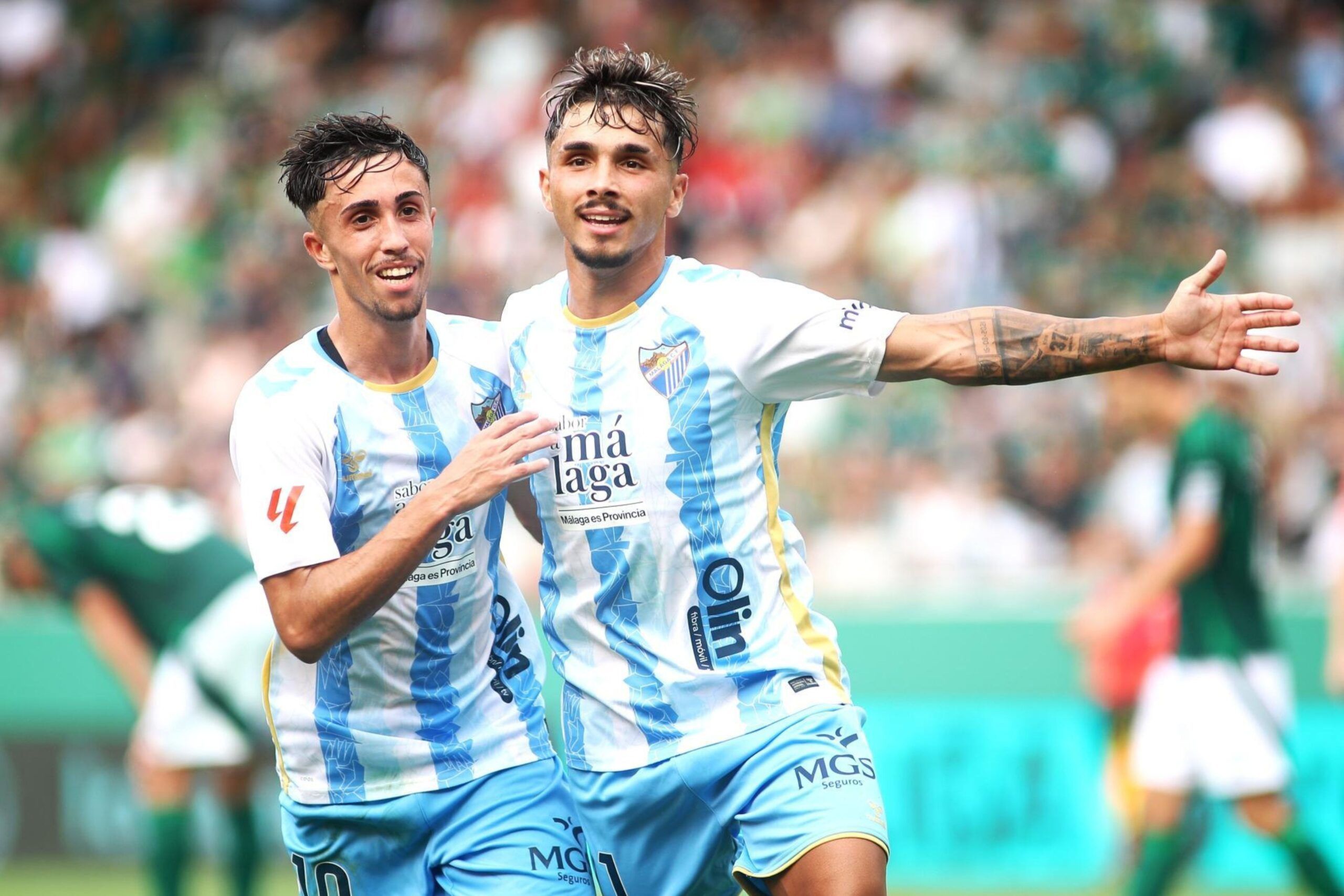 Kevin Medina y David Larrubia celebrando el gol ante el Rácing de Ferrol